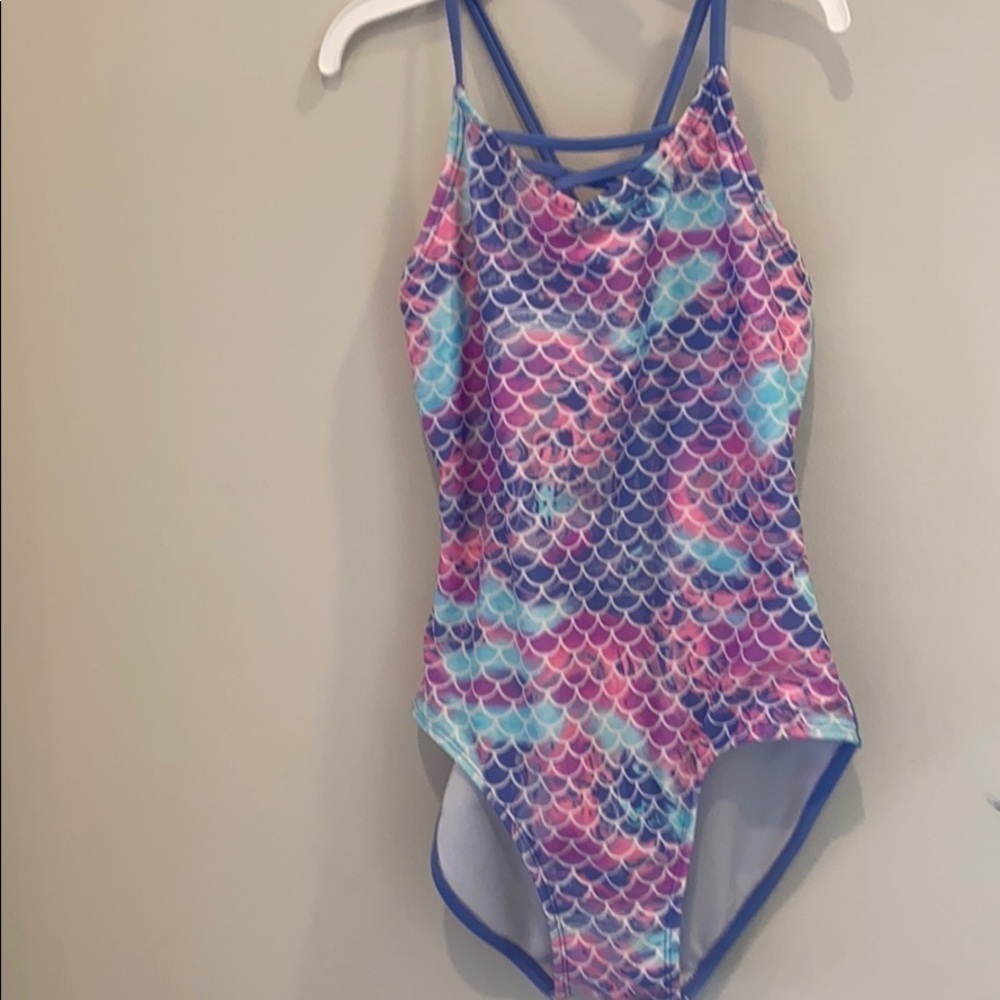 More than Magic girls one piece bathing suit.  Size large